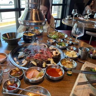 Wow.  Noodles, kimchi, bulgogoli, pork chop prepared at table with sauces.  Whoa.  Even the egg dish and rice noodle feast.