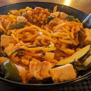 Put a lot of tofu in there. I think I might need the Sriracha sauce. I can&apos;t even taste the sweet &amp; sour sauce.
