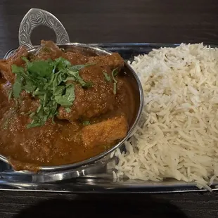 Lamb vindaloo (brings the spice)