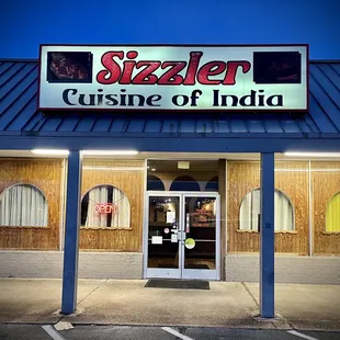 the entrance to sizzler cuisine of india
