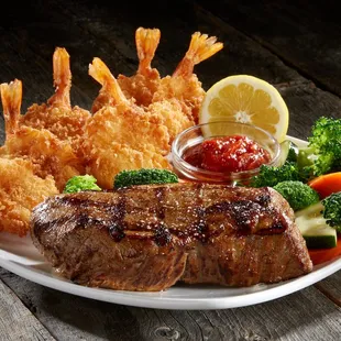 a steak and shrimp platter