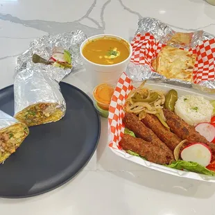 Chicken Masala Burrito, Butter Chicken, Lamb Seekh Kebab, and Garlic Naan