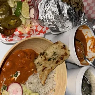 I ordered the garlic naan, white rice, and spicy buttered chicken.