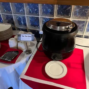 a table with plates and silverware