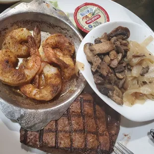 Renegade steak w/grilled shrimp &amp; a side of onion mushrooms &amp; loaded mash potato