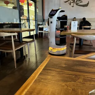 a table and chairs in a restaurant