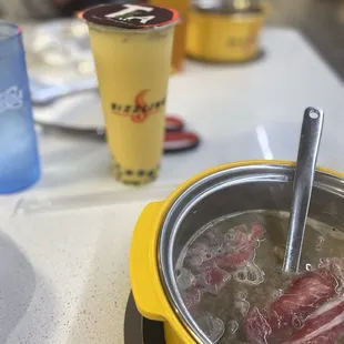 a bowl of soup with a spoon in it