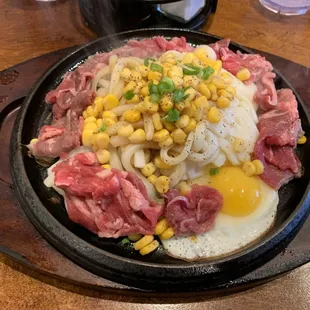 Beef Udon with a side of egg.