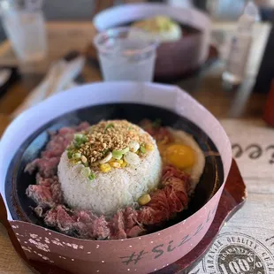 Garlic beef pepper rice with an egg added   ig: badandfoodiee