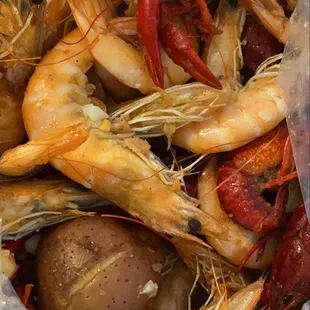 shrimp and potatoes in a plastic bag