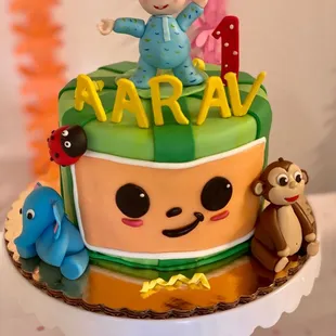 Cocomelon themed birthday cake.