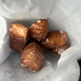 a close up of a bag of doughnuts