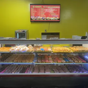 a display of various types of donuts