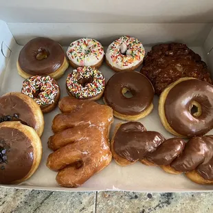a variety of donuts in a box