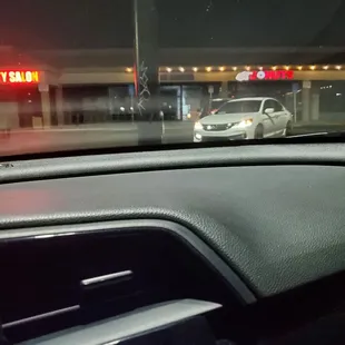 Happily sitting in my car waiting for the best donuts ever