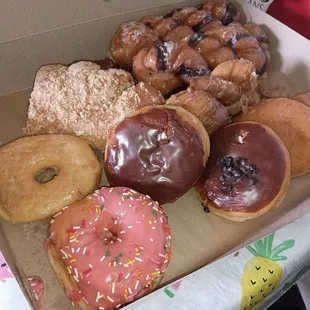 Original tiger tails, Maple tiger tail, custard and raspberry filled, Apple fritter, bear claw, glazed