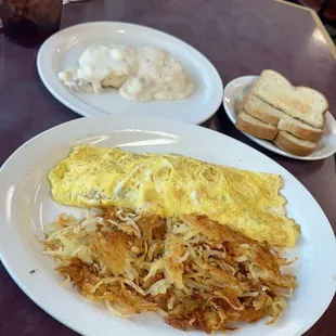 These was the ultimate omelette and a half order of biscuits and gravy  it was delicious