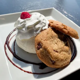 a chocolate chip cookie and whipped cream