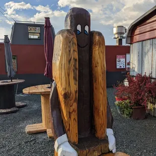 a wooden statue of a man