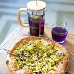 a pizza on a wooden table