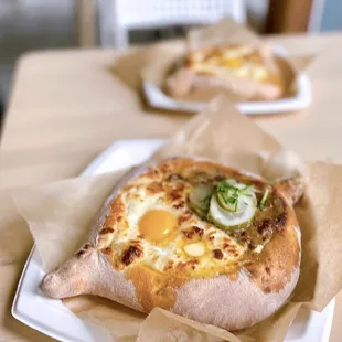 Stroganoff Khachapuri | shredded beef &amp; mushroom in creamy sauce topped with pickles