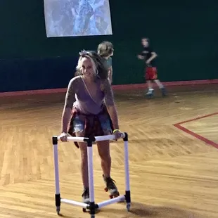 Using the skating aide.