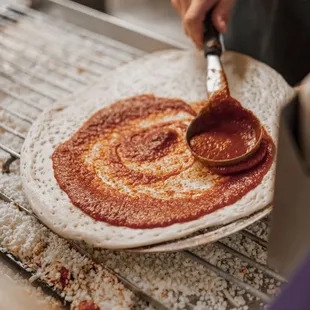 Our pizzas roll out fresh and made to order!