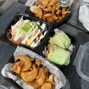 Philly cheesesteak sandwich with fries, breakfast burrito, chilaquiles, side winder fries