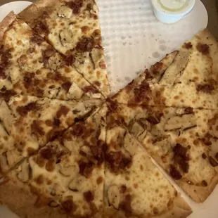 $18 for a pizza that looks like a child made it and then over cooked it for good measure.