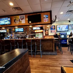people sitting at the bar