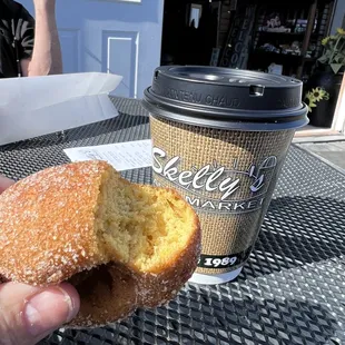 Pumpkin donut and hot apple cider with caramel