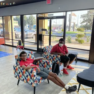 Father and son bonding time in our teen/adult sitting area.