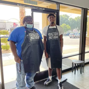 Our wonderful SketchNStudio staff sporting their aprons.