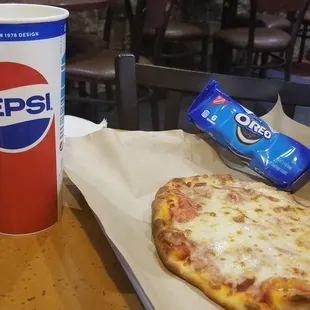 Cheese pizza.   Order as a kids&apos; meal and get an included fountain or bottled drink AND Oreos or apple snack included for $15.