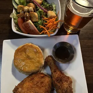 Two piece dark dinner with side salad.