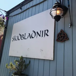 a sign on the side of a building