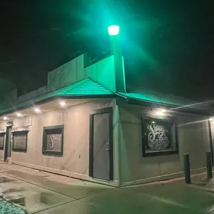 a green traffic light at night