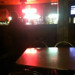 a bar with red lights
