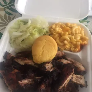 jerk chicken tip dinner w/cabbage and macaroni and cheese. Not pictured: red beans and rice that my jerk chicken tips are taking a nap on.