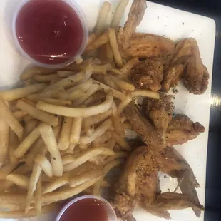 Chicken wings and fries