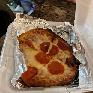 a slice of pepperoni pizza