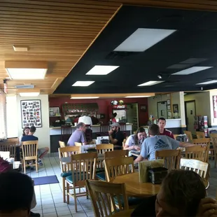 a group of people sitting at tables