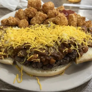 Chili Cheeseburger (open faced) w/ Tots well done.