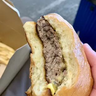 This $7.00 burger we paid $14.29 for and was asked to &quot;Just eat it.&quot;