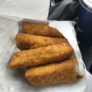 4 tasteless egg rolls I asked for two so I guess two come in one order or did he charge me for four?