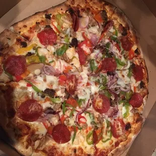 Meat lovers pizza with peppers and onions !
