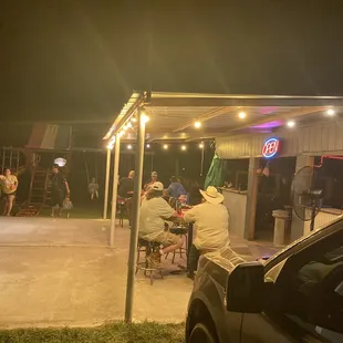 a group of people sitting at a table