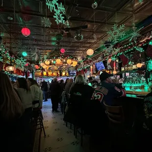 people sitting at a bar