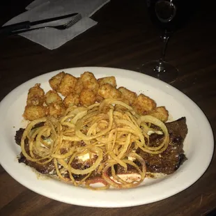 Hanger Steak and Tots with a glass of Merlot! So delish.