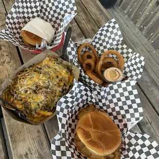 Skinny's fries with cheese, onion rings, 1/2 lb burger, steak sandwich